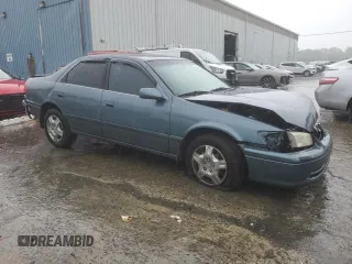 2001 Toyota Camry CE z VIN JT2BG22K710561238, wystawiony jako Copart lot #56686255 z przebiegiem Nie podano mil oraz Szkoda całkowita • Salvage title. Historia ofert i sprzedaży dostępna na DreamBid. Obrazek 4.