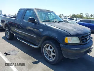 2001 Ford F-150 XL with VIN 1FTZX17241NB26494, listed as a IAAI auction lot 42639753 with Not provided miles and . Bid and sale history available at DreamBid. Image 1.