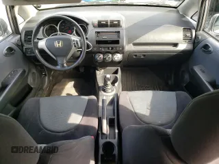 2007 Honda Fit Sport z VIN JHMGD37677S001013, wystawiony jako Copart lot #58792605 z przebiegiem 157 960 mil mil oraz Czysty tytuł • Clean title. Historia ofert i sprzedaży dostępna na DreamBid. Obrazek 8.