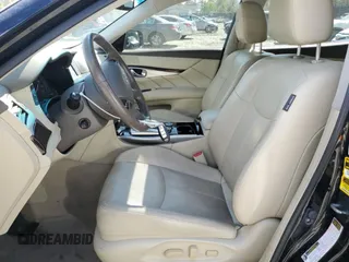 2015 Infiniti Q70 with VIN JN1BY1PR1FM831393, listed as a Copart auction lot 53310175 with 94,320 mi miles and Salvage title. Bid and sale history available at DreamBid. Image 7.