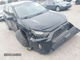 2019 Toyota RAV4 LE with VIN JTMF1RFV4KD030550, listed as a IAAI auction lot 40596628 with 92,318 mi miles and . Bid and sale history available at DreamBid. Image 6.