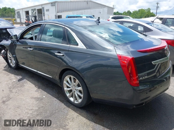 2013 Cadillac XTS Luxury z VIN 2G61P5S34D9109189, wystawiony jako IAAI lot #42242533 z przebiegiem 178 234 mil mil oraz . Historia ofert i sprzedaży dostępna na DreamBid. Obrazek 3.