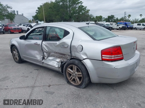 2008 Dodge Avenger SXT with VIN 1B3LC56K98N213958, listed as a IAAI auction lot 41829798 with 128,123 mi miles. Bid and sale history available at carsss.com. Image 3.