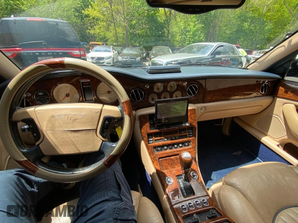 2002 Bentley Arnage with VIN SCBLC31E62CX08029, listed as a Copart auction lot 57389945 with 86,082 mi miles and Clean Title. Bid and sale history available at DreamBid. Image 9.