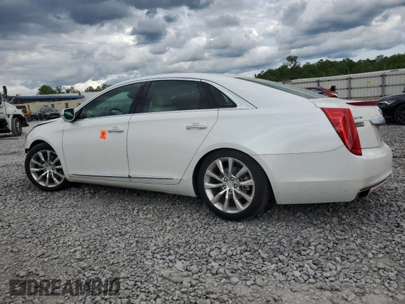 2016 Cadillac XTS Luxury Collection with VIN 2G61M5S34G9209483, listed as a Copart auction lot 54611105 with 23,778 mi miles and Salvage title. Bid and sale history available at DreamBid. Image 2.
