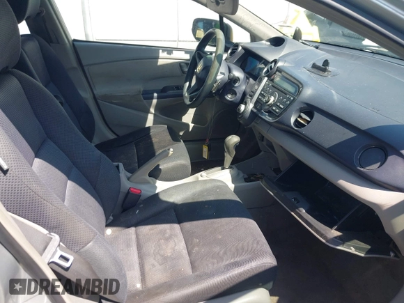 2010 Honda Insight EX with VIN JHMZE2H75AS013109, listed as a IAAI auction lot 41976886 with 226,434 mi miles and . Bid and sale history available at DreamBid. Image 5.