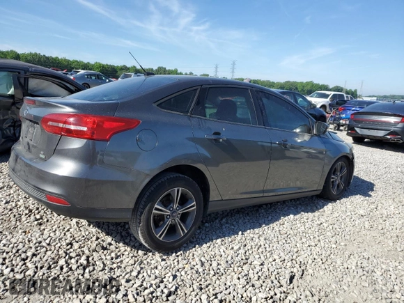 2016 Ford Focus SE with VIN 1FADP3FE8GL381855, listed as a Copart auction lot 57366645 with 104,709 mi miles and Salvage title. Bid and sale history available at DreamBid. Image 3.