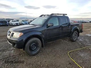 2018 Nissan Frontier SV with VIN 1N6AD0EV9JN703790, listed as a Copart auction lot 85392794 with 101,957 mi miles and Salvage title. Bid and sale history available at DreamBid. Image 1.