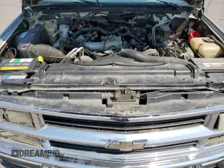 1994 Chevrolet Suburban z VIN 1GNGK26F1RJ444762, wystawiony jako Copart lot #86776674 z przebiegiem 354 375 mil mil oraz Szkoda całkowita • Salvage title. Historia ofert i sprzedaży dostępna na DreamBid. Obrazek 13.