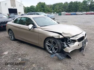 2016 BMW 4 Series 428i xDrive with VIN WBA3T1C58GP822626, listed as a IAAI auction lot 40211587 with 82,285 mi miles and . Bid and sale history available at carsss.com. Image 1.