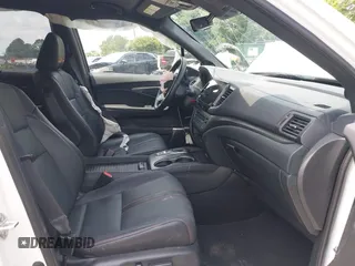 2023 Honda Passport TrailSport с VIN 5FNYF8H62PB043341, выставлен на аукционе IAAI как лот 42410337 с пробегом 20 695 миль миль и . История ставок и продаж доступна на DreamBid. Изображение 5.