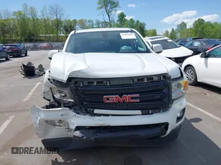 2019 GMC Canyon 4WD SLE z VIN 1GTG6CENXK1319647, wystawiony jako IAAI lot #42039568 z przebiegiem 56 371 mil mil oraz . Historia ofert i sprzedaży dostępna na DreamBid. Obrazek 13.