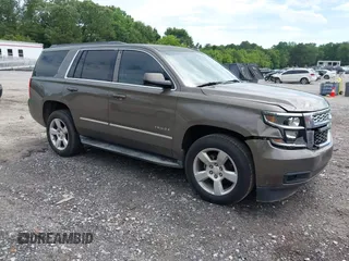 2015 Chevrolet Tahoe LT with VIN 1GNSCBKC5FR585138, listed as a IAAI auction lot 42420496 with 177,104 mi miles and . Bid and sale history available at DreamBid. Image 1.