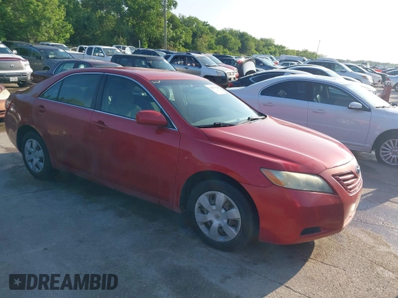 2007 Toyota Camry CE with VIN 4T1BE46K37U106127, listed as a IAAI auction lot 42088929 with 241,810 mi miles. Bid and sale history available at carsss.com. Image 1.