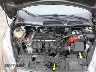 2019 Ford Fiesta SE z VIN 3FADP4BJ7KM155094, wystawiony jako IAAI lot #42186126 z przebiegiem 93 684 mil mil oraz . Historia ofert i sprzedaży dostępna na DreamBid. Obrazek 10.