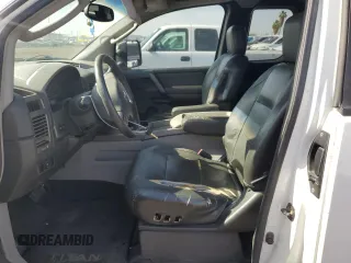 2004 Nissan Titan SE with VIN 1N6AA06B84N577326, listed as a Copart auction lot 59724355 with 179,549 mi miles and Salvage title. Bid and sale history available at DreamBid. Image 7.