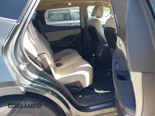 2014 Hyundai Santa Fe with VIN 5XYZUDLB0EG187984, listed as a IAAI auction lot 42607599 with 111,594 mi miles and . Bid and sale history available at DreamBid. Image 8.