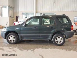 2003 Ford Escape XLS Popular with VIN 1FMYU02143KC35891, listed as a IAAI auction lot 41599760 with 148,381 mi miles. Bid and sale history available at carsss.com. Image 15.
