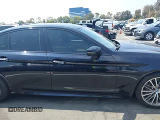 2018 BMW 5 Series 530i with VIN WBAJA5C51JG898278, listed as a IAAI auction lot 42595701 with 96,777 mi miles and . Bid and sale history available at DreamBid. Image 13.