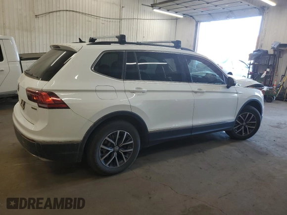 2020 Volkswagen Tiguan SE with VIN 3VV2B7AXXLM058031, listed as a Copart auction lot 76522644 with 34,361 mi miles and Salvage Title. Bid and sale history available at DreamBid. Image 3.