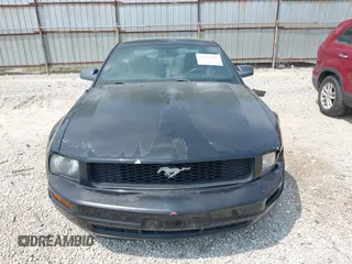 2005 Ford Mustang Deluxe z VIN 1ZVFT80N355240212, wystawiony jako IAAI lot #42426192 z przebiegiem 68 742 mil mil oraz . Historia ofert i sprzedaży dostępna na DreamBid. Obrazek 12.
