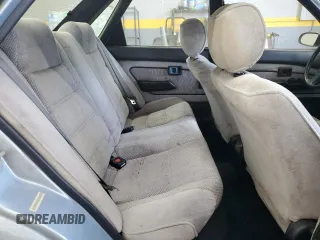 1992 Geo Prizm z VIN 1Y1SK5466NZ069241, wystawiony jako Copart lot #55314255 z przebiegiem 256 418 mil mil oraz Szkody całkowita. Historia ofert i sprzedaży dostępna na DreamBid. Obrazek 10.