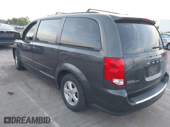 2012 Dodge Grand Caravan SXT with VIN 2C4RDGCG1CR141019, listed as a IAAI auction lot 42088541 with 148,931 mi miles and . Bid and sale history available at DreamBid. Image 3.