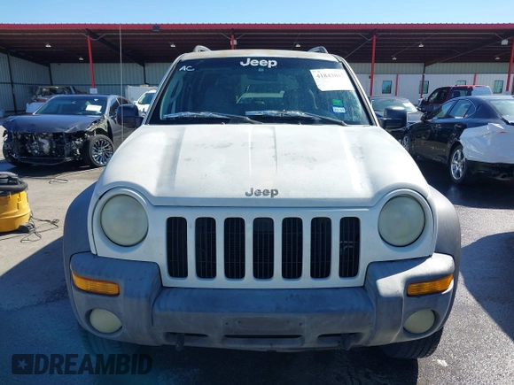 2002 Jeep Liberty Sport with VIN 1J8GL48KX2W153948, listed as a IAAI auction lot 41843882 with 180,677 mi miles. Bid and sale history available at carsss.com. Image 12.