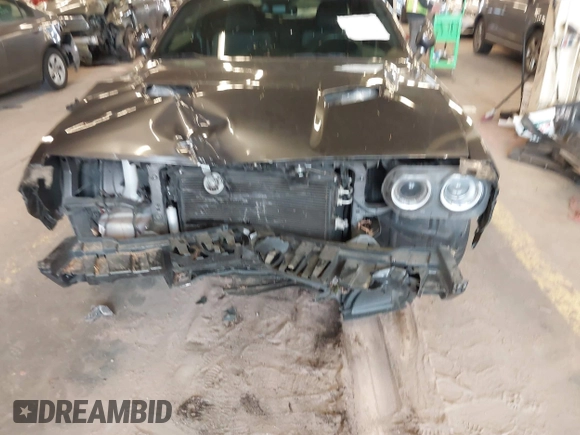 2015 Dodge Challenger R/T with VIN 2C3CDZAT5FH794310, listed as a IAAI auction lot 41725179 with 84,961 mi miles and . Bid and sale history available at DreamBid. Image 6.