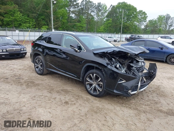 2016 Lexus RX 350 z VIN 2T2ZZMCA8GC005158, wystawiony jako IAAI lot #42105589 z przebiegiem 125 337 mil mil oraz . Historia ofert i sprzedaży dostępna na DreamBid. Obrazek 1.