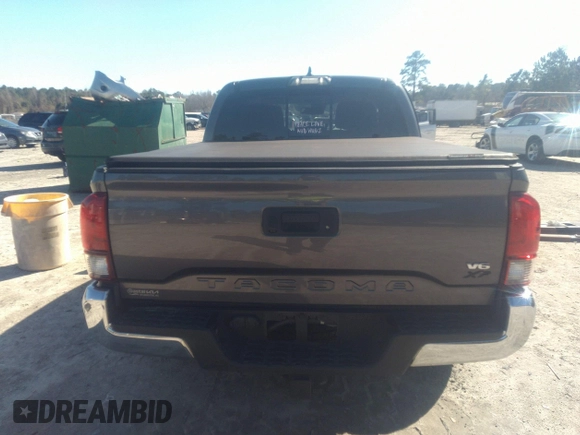 2018 Toyota Tacoma SR5 with VIN 5TFAZ5CN0JX056706, listed as a IAAI auction lot 41774141 with 31,738 mi miles and . Bid and sale history available at DreamBid. Image 16.