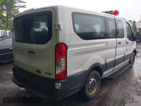2016 Ford Transit XL z VIN 1FMZK1ZM6GKB29173, wystawiony jako IAAI lot #42388672 z przebiegiem 108 076 mil mil oraz . Historia ofert i sprzedaży dostępna na DreamBid. Obrazek 4.