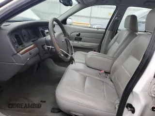 2005 Ford Crown Victoria LX z VIN 2FAFP74W95X166593, wystawiony jako Copart lot #80544294 z przebiegiem 178 591 mil mil oraz Czysty tytuł • Clean title. Historia ofert i sprzedaży dostępna na DreamBid. Obrazek 7.