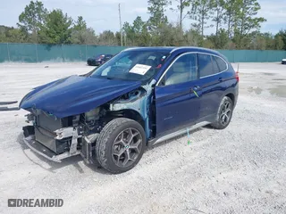 2018 BMW X1 sDrive28i with VIN WBXHU7C34J5H44572, listed as a IAAI auction lot 41607151 with 43,056 mi miles. Bid and sale history available at carsss.com. Image 18.