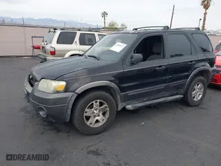 2006 Ford Escape XLT with VIN 1FMYU03156KA42961, listed as a IAAI auction lot 41820423 with 168,212 mi miles. Bid and sale history available at carsss.com. Image 12.