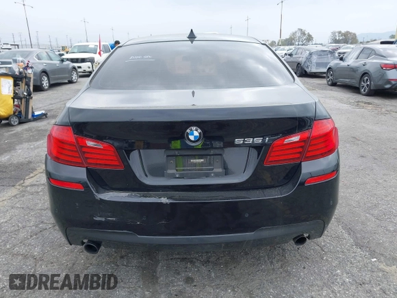 2015 BMW 5 Series 535i with VIN WBA5B1C55FG128387, listed as a IAAI auction lot 41885806 with 94,734 mi miles and . Bid and sale history available at carsss.com. Image 17.