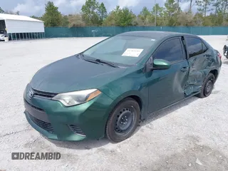 2016 Toyota Corolla L with VIN 5YFBURHE5GP384181, listed as a IAAI auction lot 41785199 with 174,839 mi miles and . Bid and sale history available at DreamBid. Image 2.