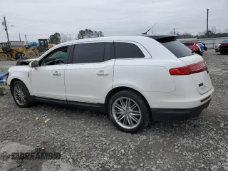 2014 Lincoln MKT EcoBoost with VIN 2LMHJ5ATXEBL50487, listed as a Copart auction lot 46649885 with 187,261 mi miles and Salvage Title. Bid and sale history available at DreamBid. Image 2.