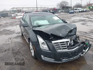 2013 Cadillac XTS Luxury z VIN 2G61R5S35D9100771, wystawiony jako IAAI lot #41673766 z przebiegiem 41 123 mil mil oraz . Historia ofert i sprzedaży dostępna na DreamBid. Obrazek 18.