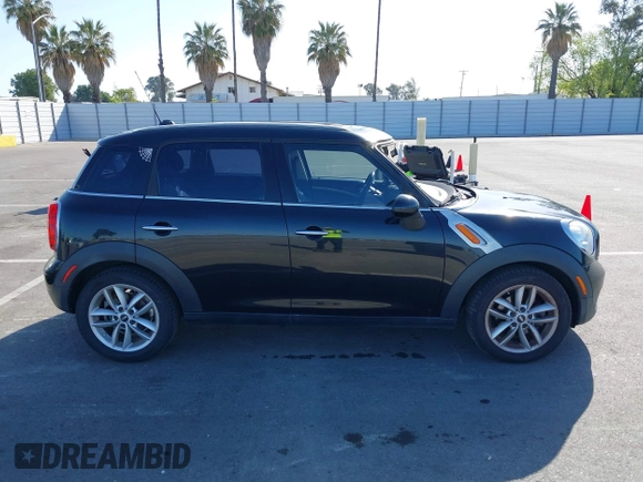 2013 MINI Countryman z VIN WMWZB3C52DWM07621, wystawiony jako IAAI lot #42085389 z przebiegiem 153 714 mil mil oraz . Historia ofert i sprzedaży dostępna na DreamBid. Obrazek 13.