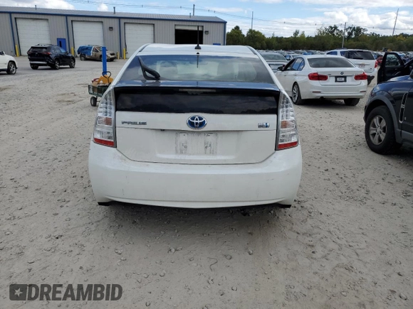 2010 Toyota Prius II z VIN JTDKN3DU1A0127124, wystawiony jako Copart lot #73313634 z przebiegiem 102 687 mil mil oraz Nie do naprawy • Non repairable. Historia ofert i sprzedaży dostępna na DreamBid. Obrazek 6.