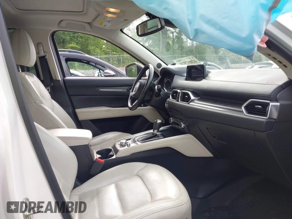 2018 Mazda CX-5 Grand Touring with VIN JM3KFBDM0J0308813, listed as a IAAI auction lot 42657978 with 78,119 mi miles and . Bid and sale history available at DreamBid. Image 5.