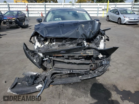 2014 Ford Fusion Titanium with VIN 3FA6P0K90ER190672, listed as a Copart auction lot 50535565 with 139,077 mi miles and Salvage Title. Bid and sale history available at DreamBid. Image 5.
