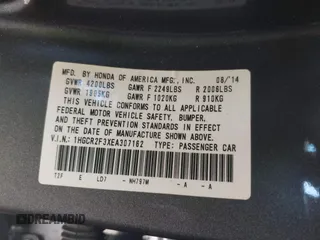 2014 Honda Accord LX z VIN 1HGCR2F3XEA307162, wystawiony jako IAAI lot #42371221 z przebiegiem 144 818 mil mil oraz . Historia ofert i sprzedaży dostępna na DreamBid. Obrazek 9.