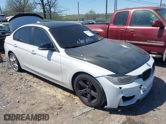 2014 BMW 3 Series 320i with VIN WBA3B1C51EK132083, listed as a IAAI auction lot 41985295 with 158,626 mi miles. Bid and sale history available at carsss.com. Image 1.