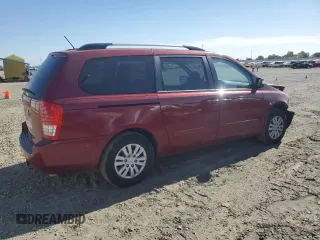 2012 Kia Sedona LX with VIN KNDMG4C79C6483194, listed as a Copart auction lot 77485374 with 110,831 mi miles and Salvage Title. Bid and sale history available at carsss.com. Image 3.