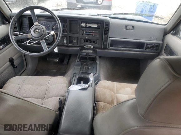 1993 Jeep Cherokee Sport with VIN 1J4FT68S4PL588241, listed as a Copart auction lot 80115884 with 204,174 mi miles and Salvage Title. Bid and sale history available at carsss.com. Image 8.