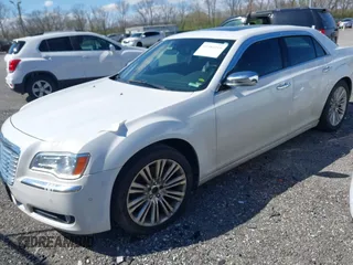 2011 Chrysler 300 with VIN 2C3CA6CT0BH529230, listed as a IAAI auction lot 41983319 with 197,344 mi miles. Bid and sale history available at carsss.com. Image 2.