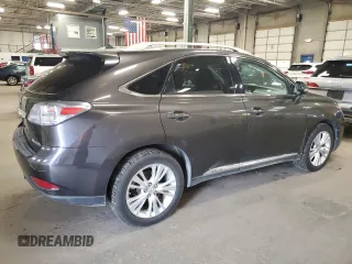 2010 Lexus RX 450h with VIN JTJBC1BA6A2412549, listed as a Copart auction lot 53206825 with 242,407 mi miles and Clean title. Bid and sale history available at DreamBid. Image 3.