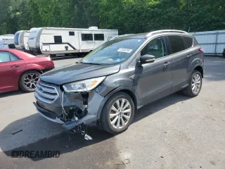 2018 Ford Escape Titanium with VIN 1FMCU9J91JUA47420, listed as a Copart auction lot 61846795 with 77,246 mi miles and Salvage title. Bid and sale history available at DreamBid. Image 1.